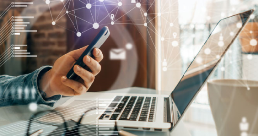 channel partner using technology on mobile and laptop